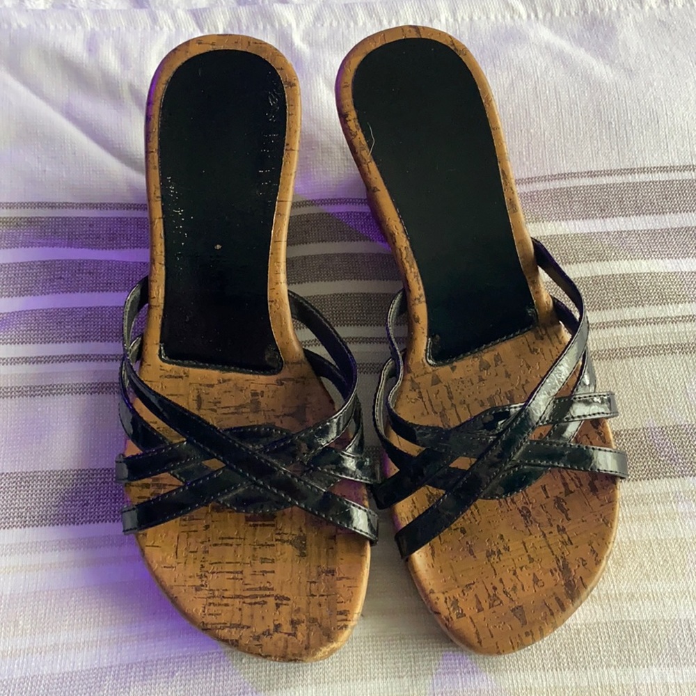 Cute lightly worn black/brown wedges.
